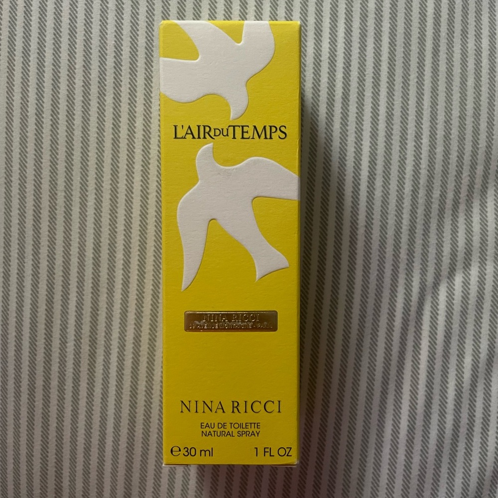 Nina Ricci L'Air du Temps Yellow Box with White Dove